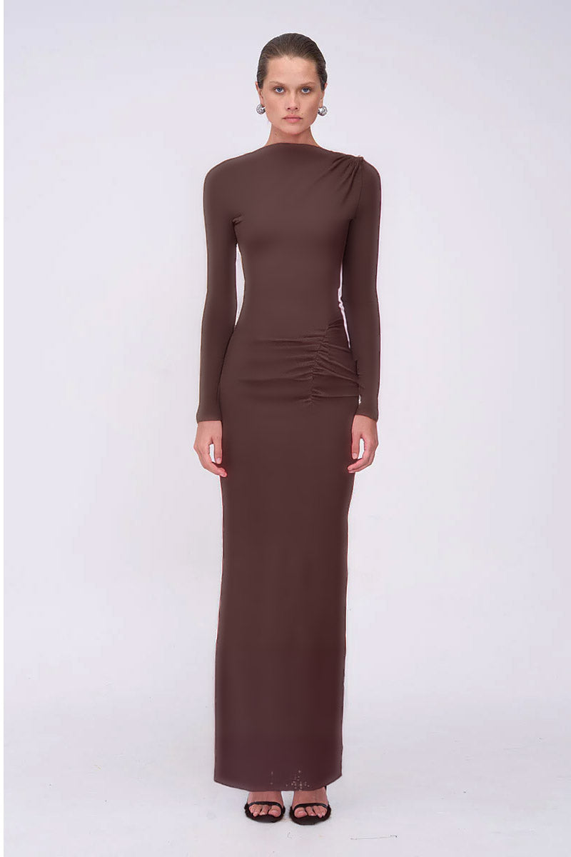 Woman wearing a brown long-sleeve dress 