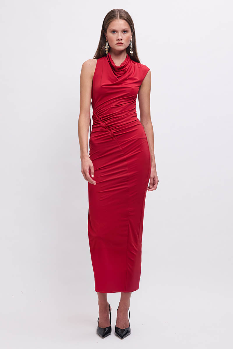 Woman wearing a red dress on a white background